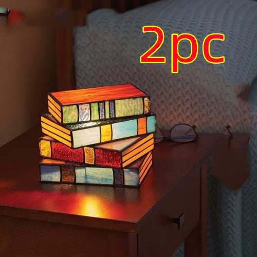Desk lamp with stacked books