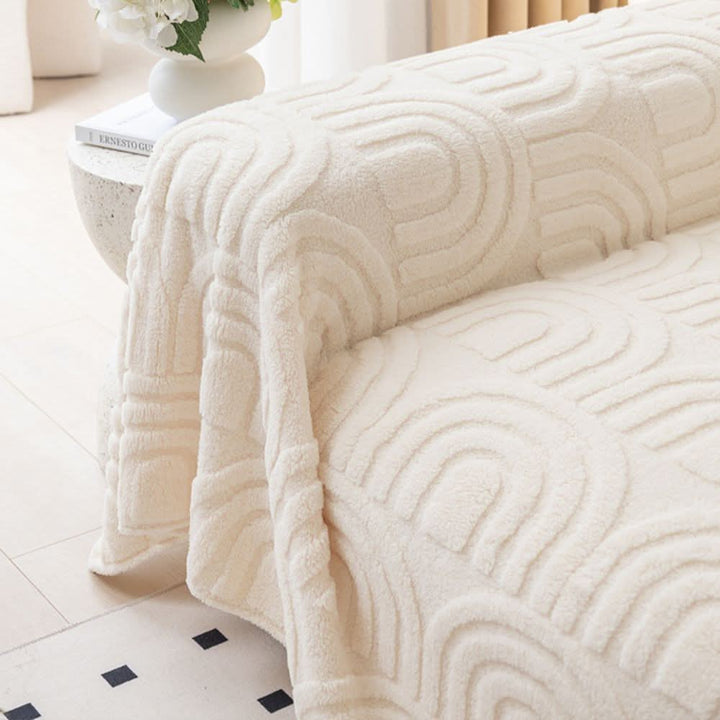 Thick quilted sofa cover for secure fit