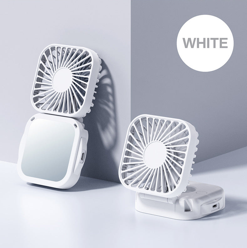Unisex nan compact foldable clip on handheld desk fan with built in mirror adjustable tilt and USB rechargeable battery
