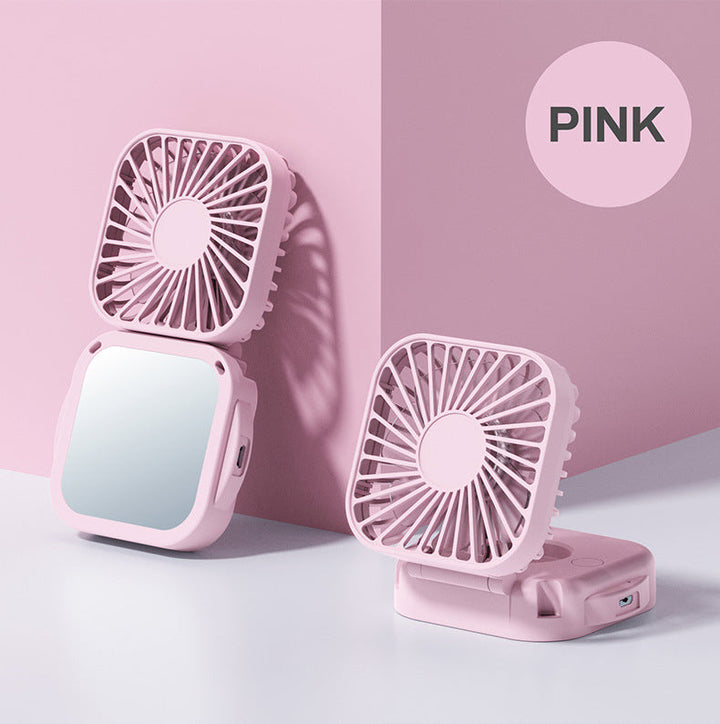 Unisex nan compact foldable clip on handheld desk fan with built in mirror adjustable tilt and USB rechargeable battery