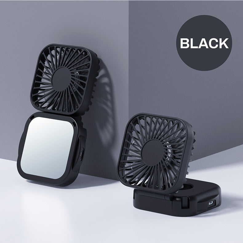 Unisex nan compact foldable clip on handheld desk fan with built in mirror adjustable tilt and USB rechargeable battery