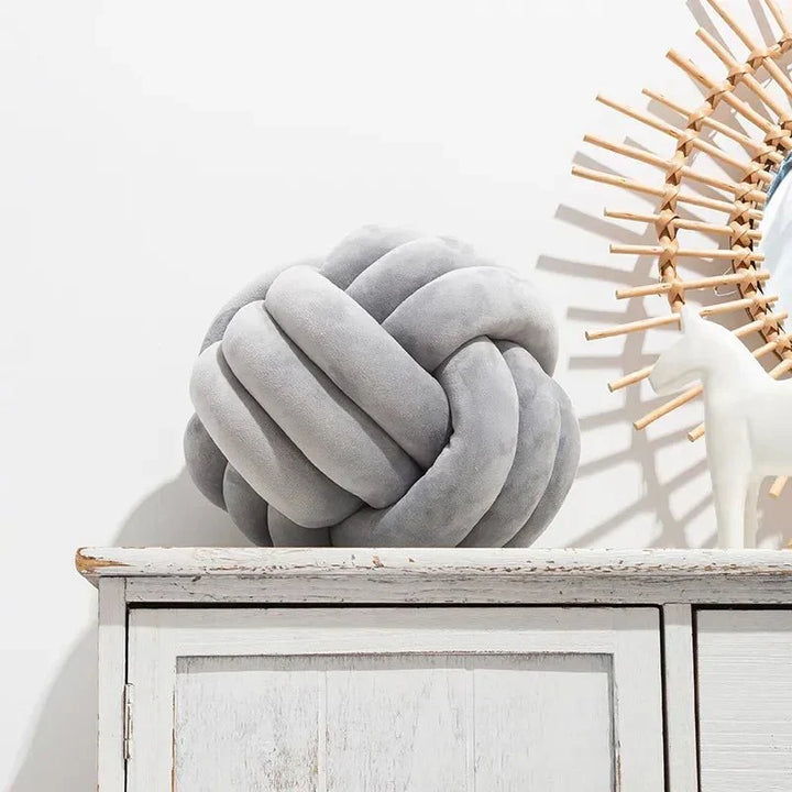 BowLift | Decorative, soft cushion with knotted ball in suede look