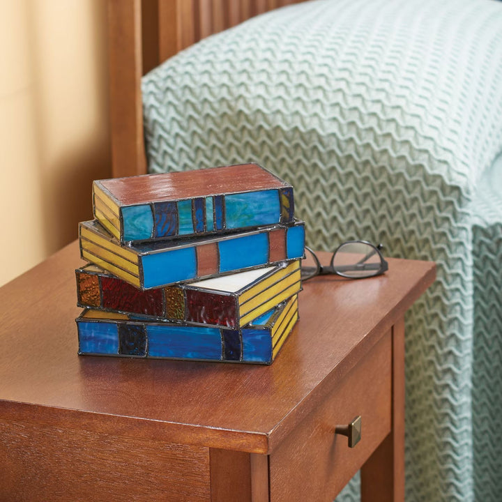 Desk lamp with stacked books